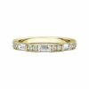 baguette and channel set round diamond wedding band