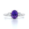 purple sapphire three stone ring