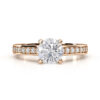 rose gold engagement ring with round diamond and diamond band 4