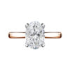 two tone metal oval diamond solitaire engagment ring with hidden diamonds
