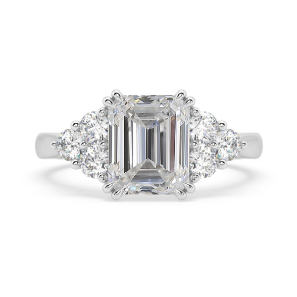 emerald cut diamond three round side stone ring