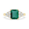 emerald gemstone ring with diamond cluster