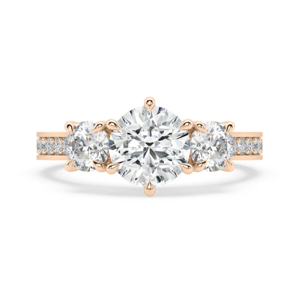 round three stone six claw engagement ring